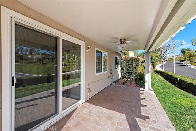 view of patio with a ceiling fan