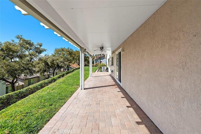 view of patio with ceiling fan