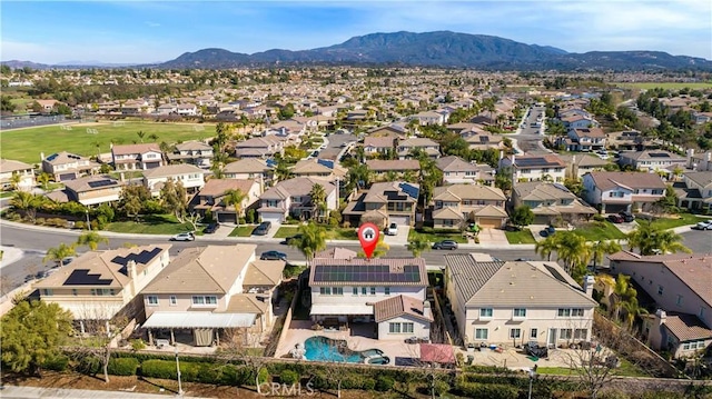 bird's eye view featuring a residential view and a mountain view