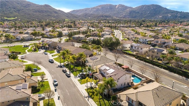 birds eye view of property featuring a residential view and a mountain view