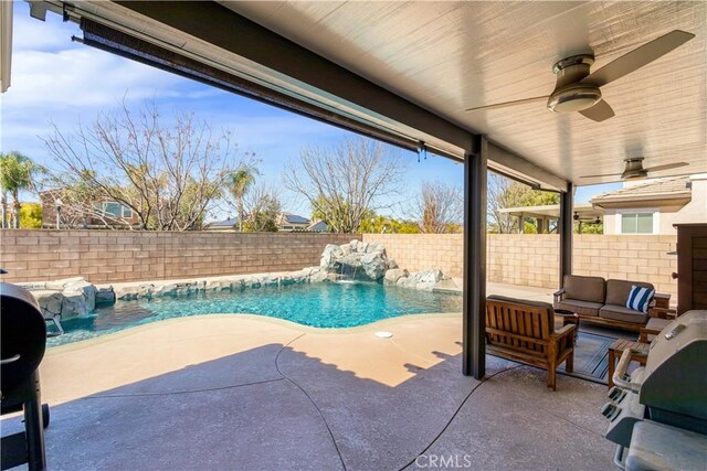 view of pool with a ceiling fan, a fenced in pool, a fenced backyard, an outdoor hangout area, and a patio area