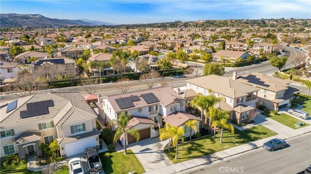 aerial view featuring a residential view and a mountain view