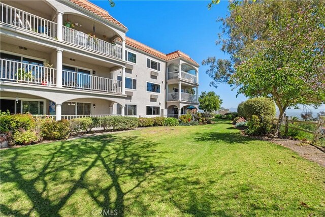 4012 Calle Sonora Oeste Unit 1B, Laguna Woods, CA 92637 - view of home's community with a yard