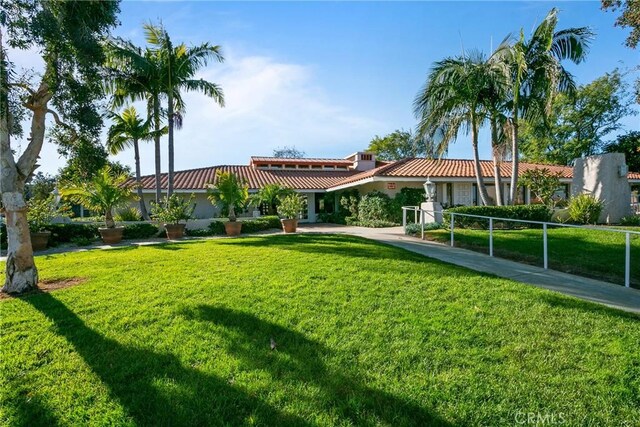 4012 Calle Sonora Oeste Unit 1B, Laguna Woods, CA 92637 - view of home's community featuring a lawn