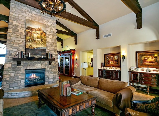 living room featuring high vaulted ceiling, visible vents, beam ceiling, and a fireplace