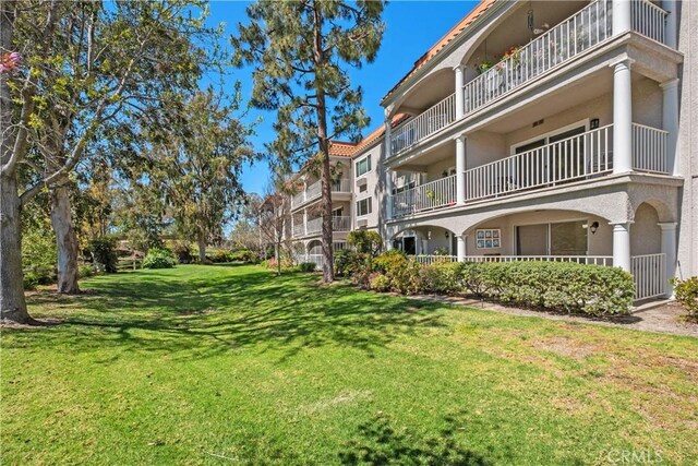4012 Calle Sonora Oeste Unit 1B, Laguna Woods, CA 92637 - view of home's community featuring a lawn
