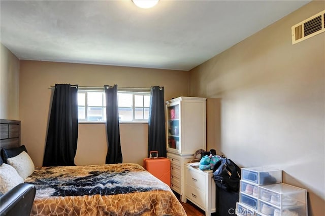 bedroom with visible vents