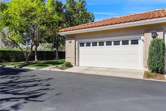 garage with fence