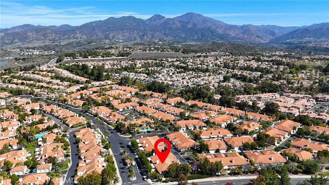 drone / aerial view with a residential view and a mountain view