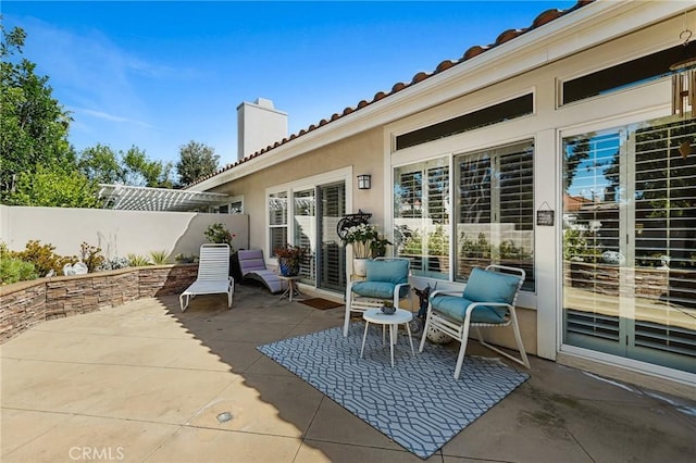 view of patio / terrace with fence