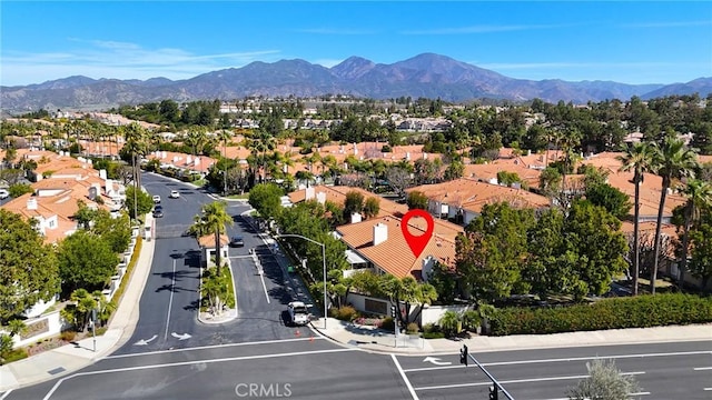 bird's eye view featuring a residential view and a mountain view