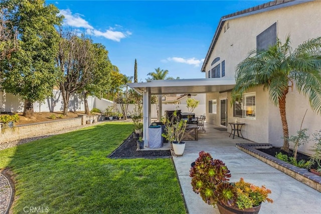 view of yard featuring a fenced backyard and a patio area