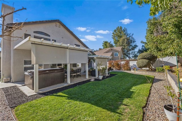 view of yard featuring a patio area, a fenced backyard, a pergola, and a hot tub