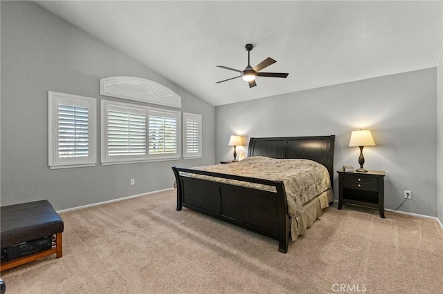 bedroom featuring lofted ceiling, carpet flooring, baseboards, and ceiling fan