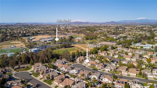 bird's eye view with a mountain view and a residential view