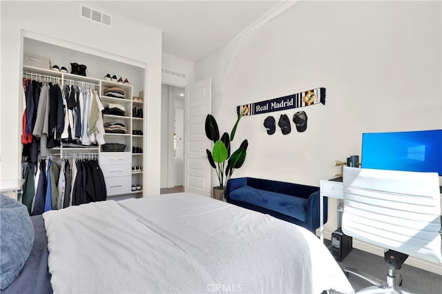 bedroom featuring a closet and visible vents