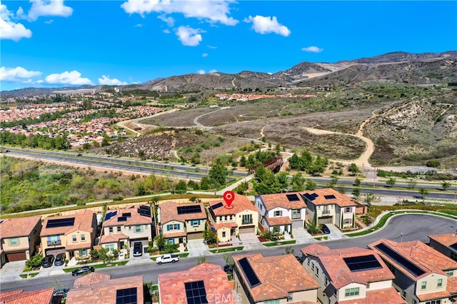 aerial view with a residential view and a mountain view