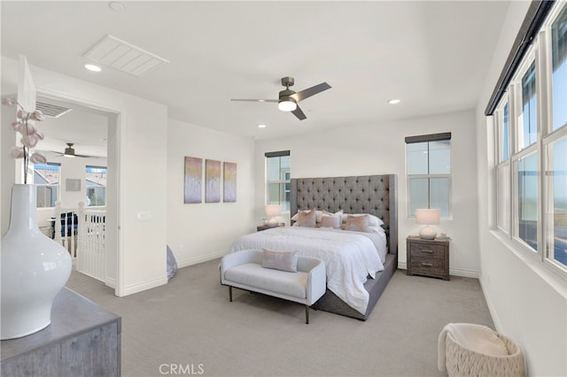 carpeted bedroom featuring recessed lighting, ceiling fan, and baseboards