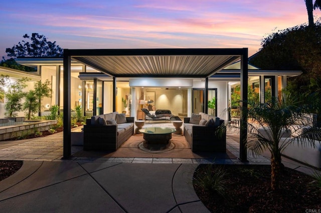 patio terrace at dusk with outdoor lounge area