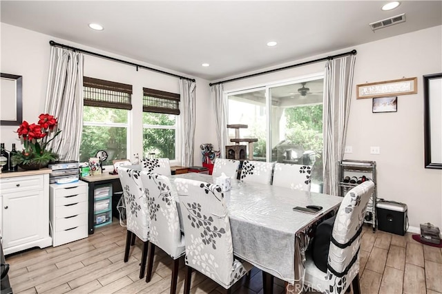 dining room featuring recessed lighting, visible vents, and wood finish floors