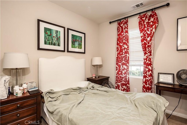 bedroom with visible vents