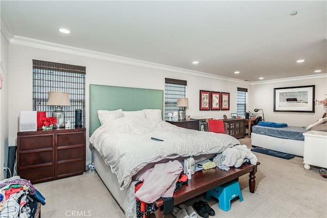 carpeted bedroom featuring ornamental molding and recessed lighting