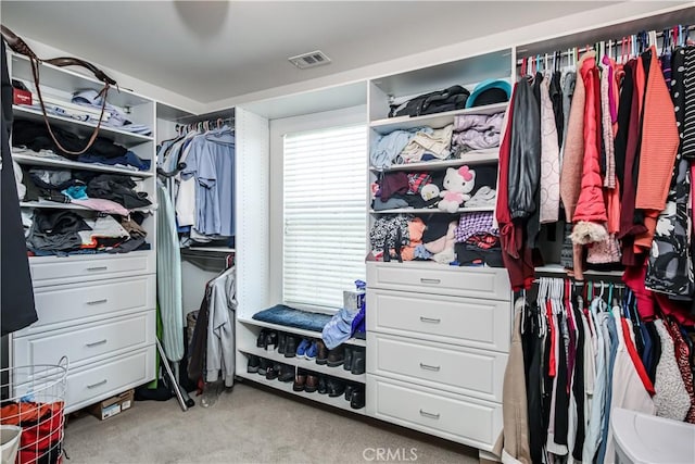 spacious closet featuring carpet floors and visible vents