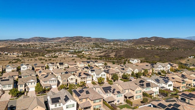 bird's eye view with a residential view and a mountain view