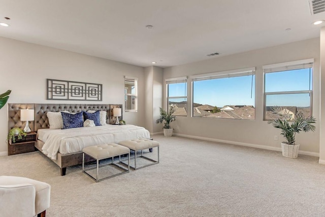 bedroom featuring carpet, recessed lighting, visible vents, and baseboards