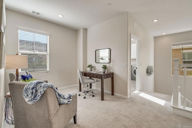 office space with carpet floors, recessed lighting, washer / clothes dryer, and visible vents