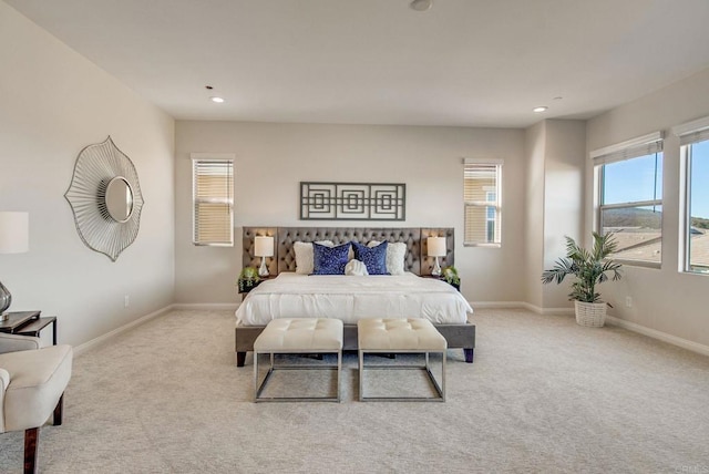 bedroom featuring baseboards, carpet flooring, and recessed lighting