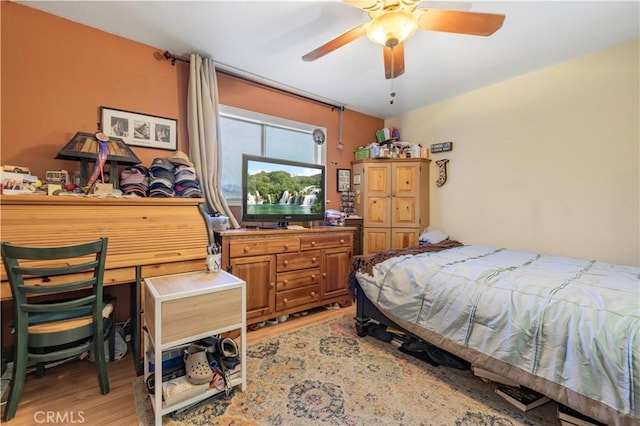 bedroom featuring light wood-style floors