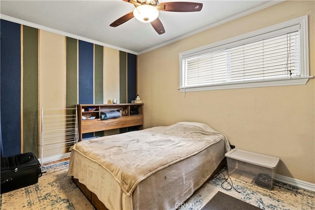 bedroom featuring crown molding, baseboards, and ceiling fan