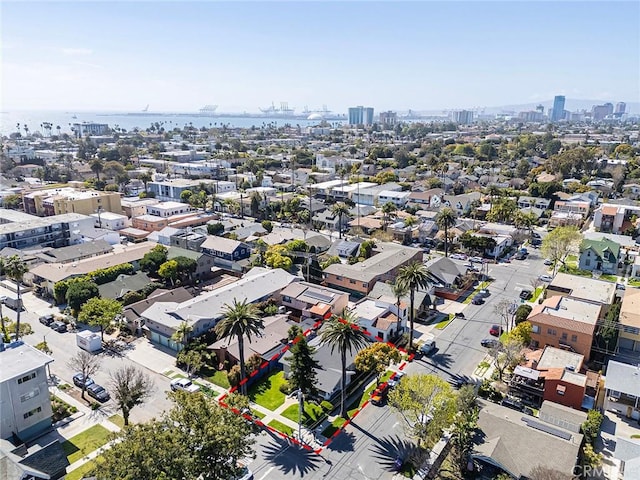 birds eye view of property featuring a city view