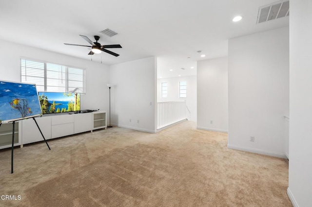 interior space featuring baseboards, visible vents, carpet flooring, and recessed lighting