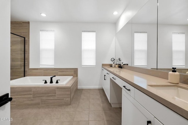 full bath with recessed lighting, tiled shower, a bath, tile patterned floors, and double vanity