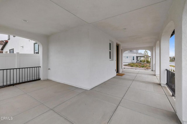 view of patio featuring fence