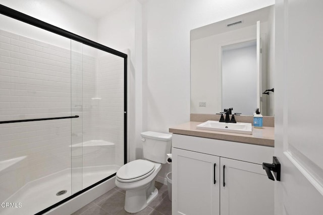 full bath featuring tile patterned flooring, a shower stall, and toilet