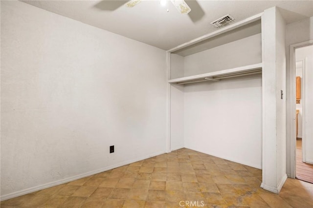 unfurnished bedroom featuring visible vents and ceiling fan