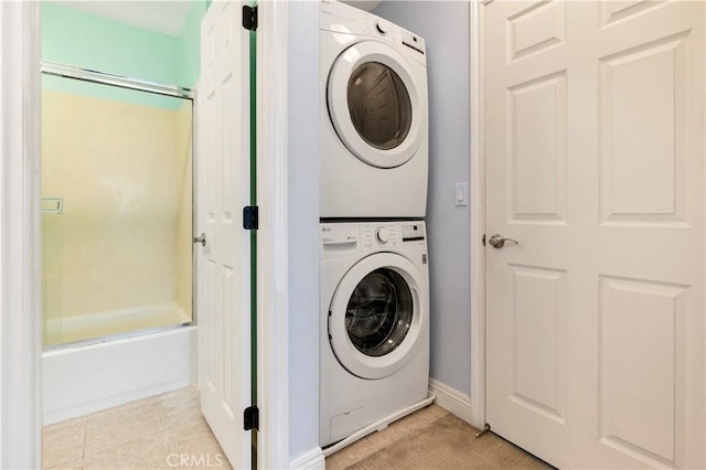 3535 Madison Ave, Unit San Diego, CA 92116 - washroom with stacked washer / drying machine and baseboards