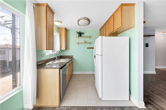 3535 Madison Ave, Unit San Diego, CA 92116 - kitchen with freestanding refrigerator, a sink, dishwasher, baseboards, and dark countertops