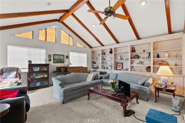 living area featuring high vaulted ceiling, carpet flooring, beamed ceiling, and ceiling fan