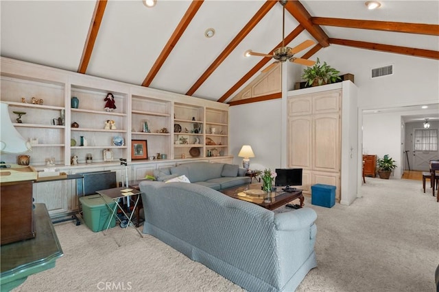 living area featuring light carpet, visible vents, a ceiling fan, beamed ceiling, and high vaulted ceiling