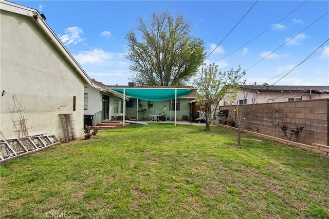 view of yard with fence