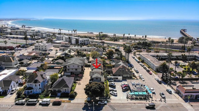 aerial view with a beach view and a water view