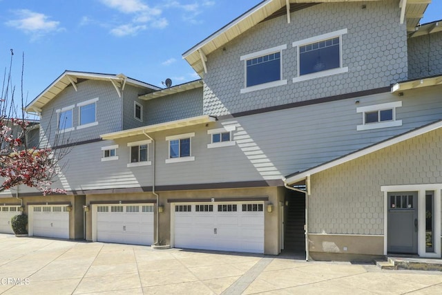 exterior space featuring driveway and a garage