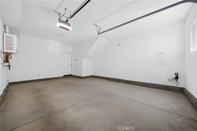 garage with baseboards and a garage door opener