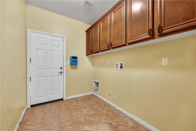 laundry room with visible vents, washer hookup, cabinet space, and baseboards