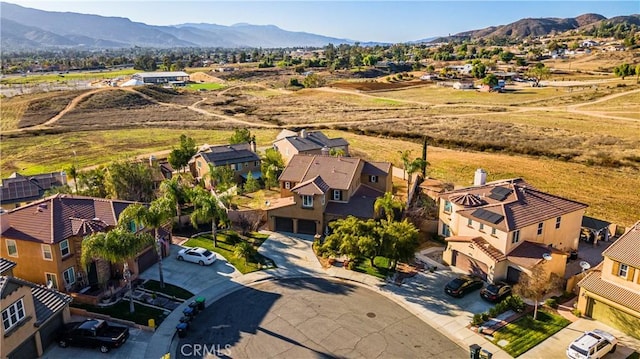 drone / aerial view with a residential view and a mountain view