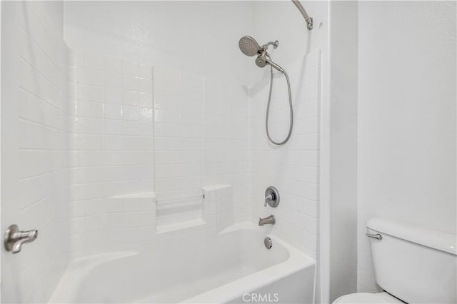 full bath featuring washtub / shower combination and toilet